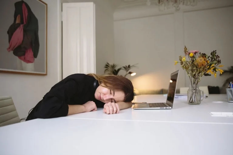 Woman Sleeping with Laptop inSleep Mode